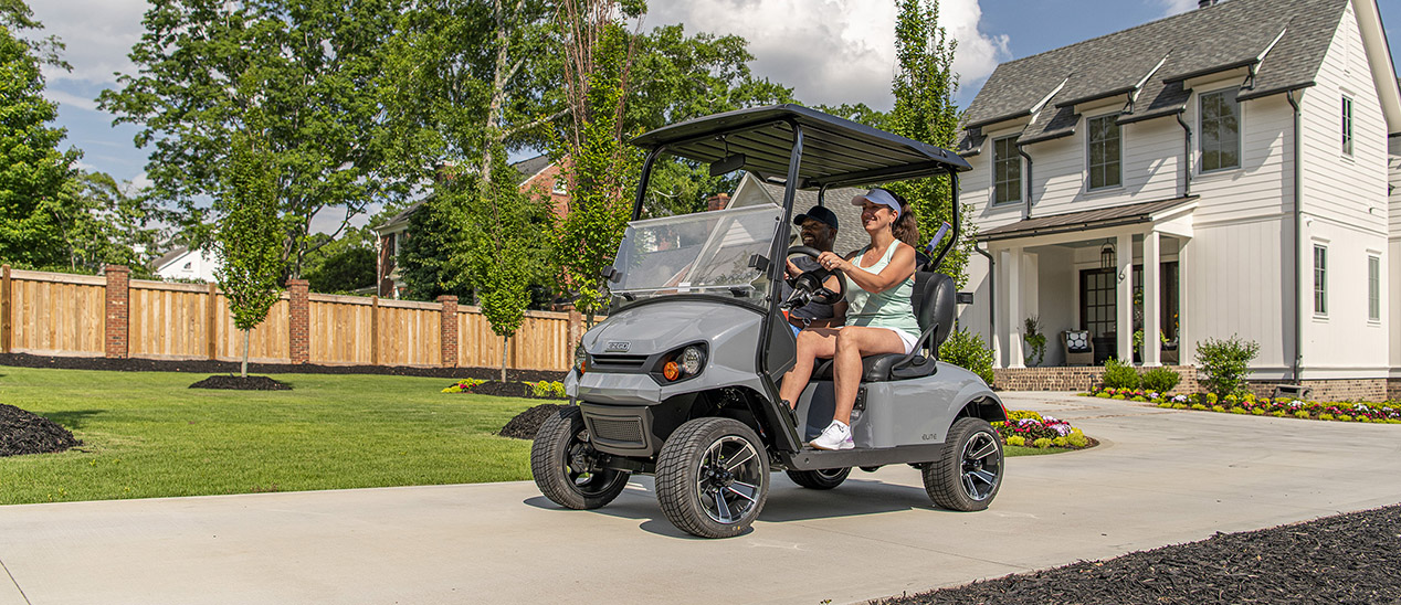 E-Z-GO Express S2 driving down a driveway